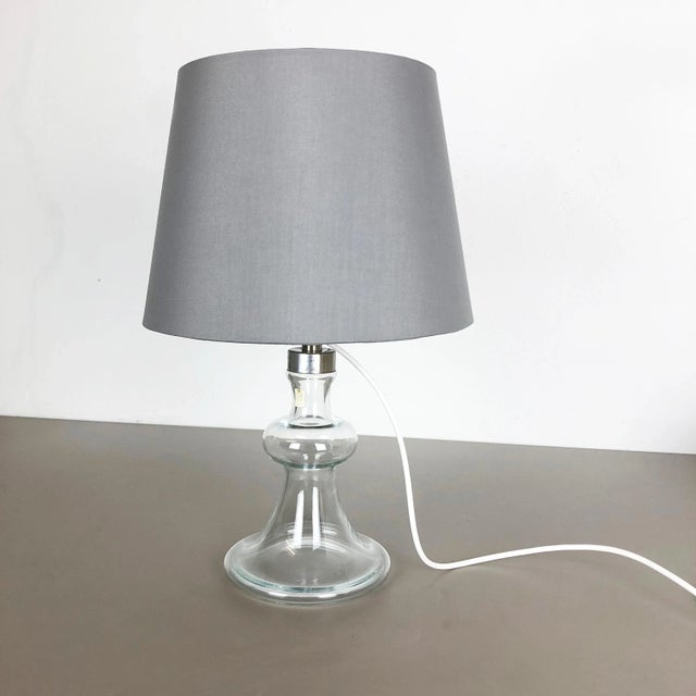 Article: glass table light base producer: holmegaard, denmark decade: 1970s this original vintage glass light base was...