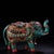 A gorgeous vintage bronze elephant sculpture hand-adorned with mosaic turquoise tilework, vibrant colored stone inlays,...