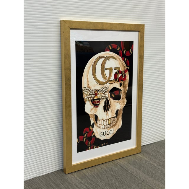 Design Plus Gallery presents the Gucci Skull II Framed Art Print by Studio One. The composition depicts a skull bearing an...