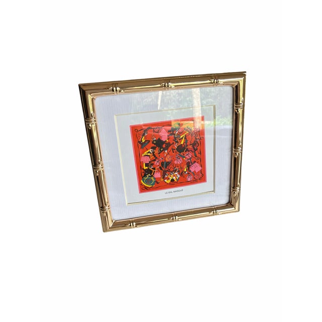 A chic vintage decorative art print featuring Hermès’ whimsical “Le Bal Masqué” design, of Scarf beautifully presented in...