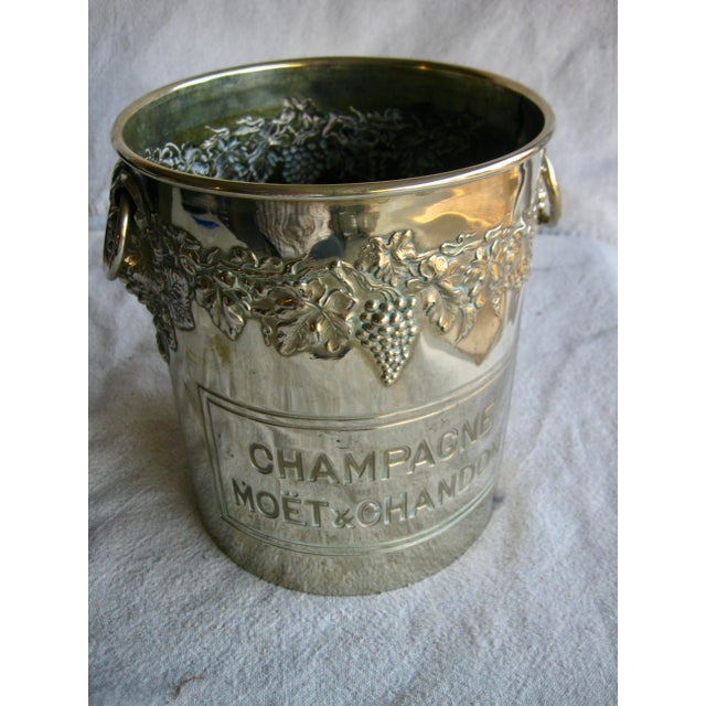 Impressive and elegant this beautiful rare champagne bucket from the prestigious brand of Moet et Chandon , shows a...