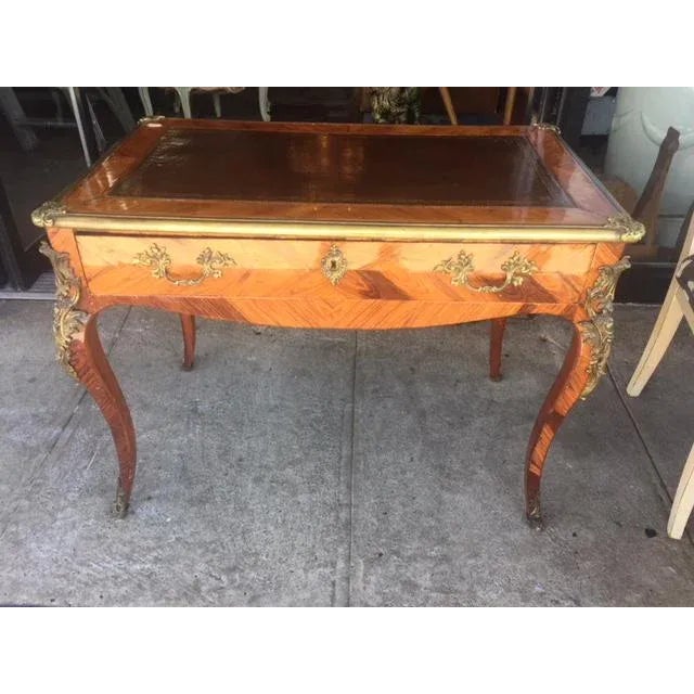 Late 18th Century to Early 19th Century French Bronze Mounted Single Drawer Writing Table With Brown Leather Top. This...
