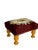 Charming vintage upholstered footstool featuring a rich burgundy color intricate floral needlepoint and beautifully turned...