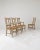 Handcrafted in Belgium in the 20th century, this set of four dining chairs showcases a gracefully flowing silhouette...
