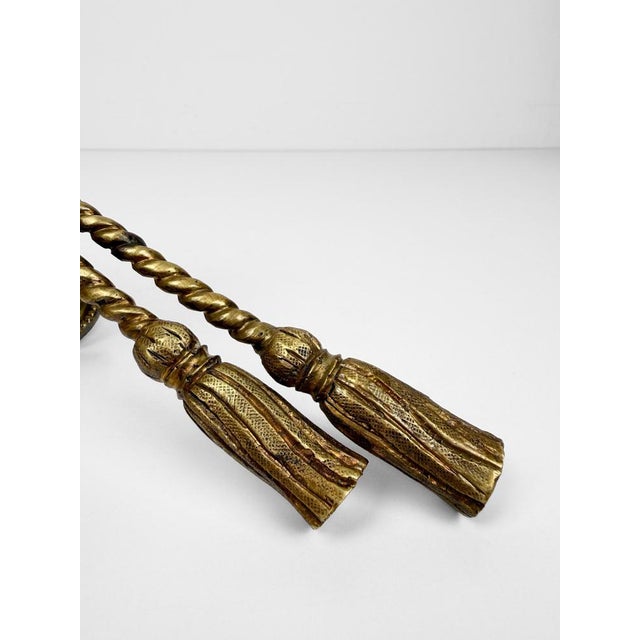 Stunning pair of sculptural solid brass handles in the iconic Hollywood Regency style. Made in Italy and sourced locally...