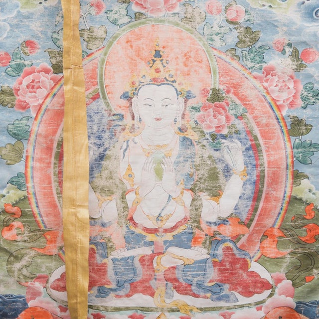 Thangkas are devotional paintings displayed by Buddhists in monasteries, temples, and even in their homes. The rich red,...