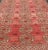 Antique Turkomen Ersari rug with Repeating Gul Design in soft red background, green, light blue, butter yellow. Hand-...