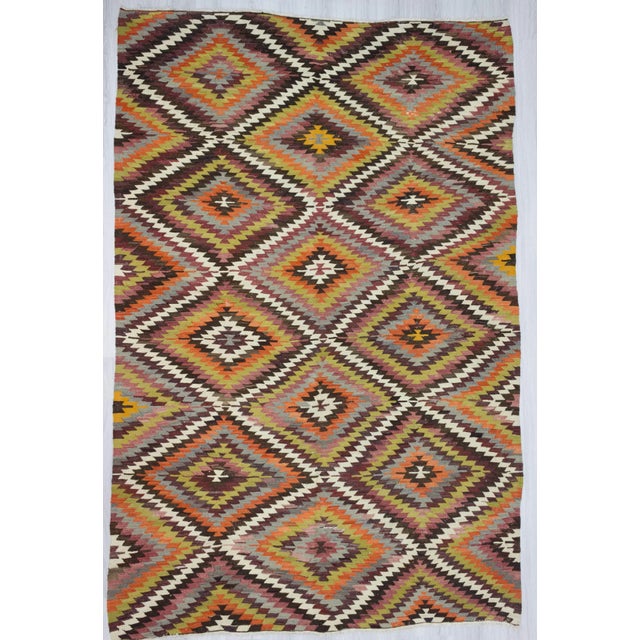 Handwoven vintage oversize Turkish kilim rug from Denizli region of Turkey. In very good condition. Approximately 45-55...