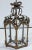 Gilt tin French tole lantern. Lantern height with stem and canopy is 22 inches. Lantern has five panels. Gilt metal. Not...
