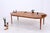An elegant extendable dining table by Johannes Andersen from the 1960s. Its harmonious proportions, beautiful teak grain,...