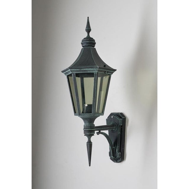This outdoor wall lantern was produced by the Norwegian manufacturer Noral. Famous for creating lighting that withstands...