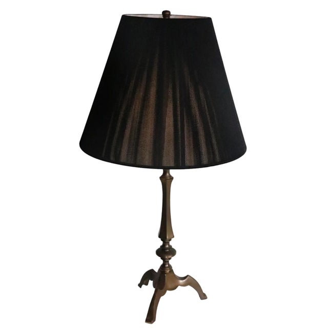 Classic brass candle stick form electric table lamp by well respected maker, Warren Kessler. The lamp features two pull...