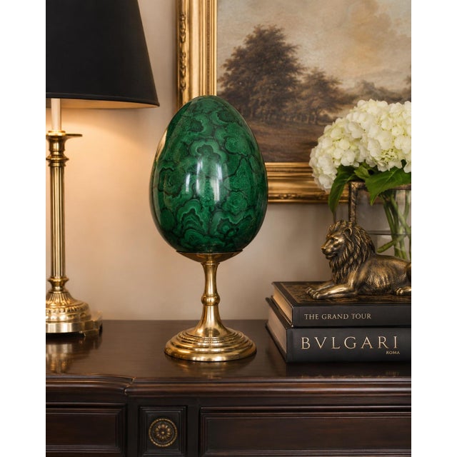 A stunning oversized decorative egg designed by Maitland-Smith and handcrafted in the Philippines. This sculptural accent...