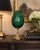 A stunning oversized decorative egg designed by Maitland-Smith and handcrafted in the Philippines. This sculptural accent...