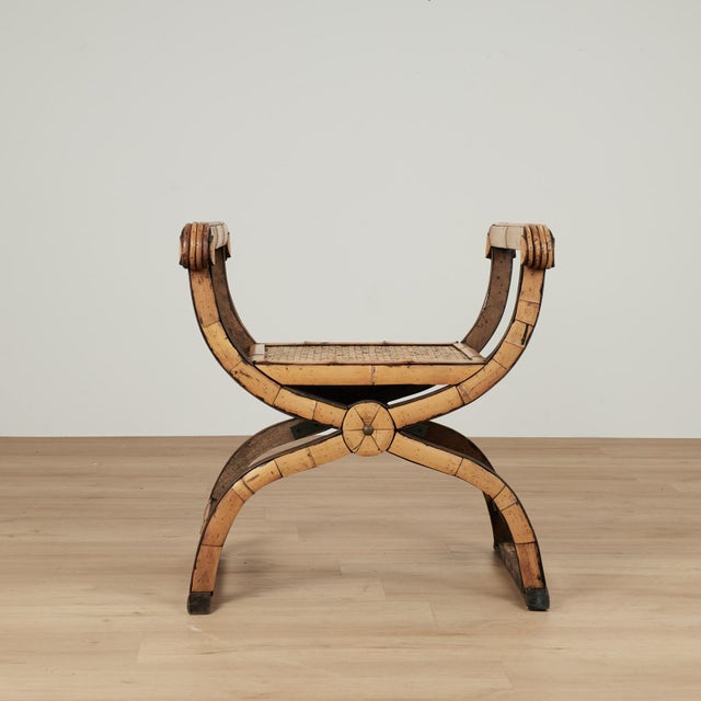 Standout vintage Chinese bench crafted in an ancient classic form having a wood framed decorated in inscribed floral...