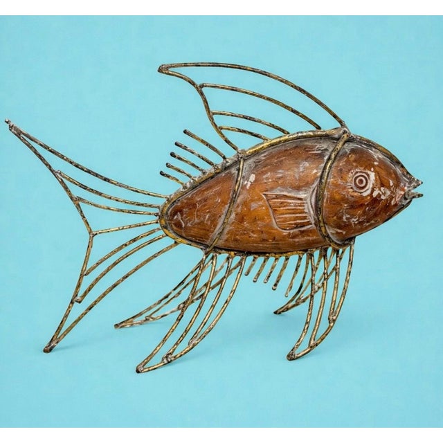 A great vintage French wood sculpture of a fish with gilded metal, perfect for a gift or your coastal decor.