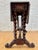 Rare Spanish Baroque Revival drop-leaf table with richly carved details, dating from the early 20th century. The piece...