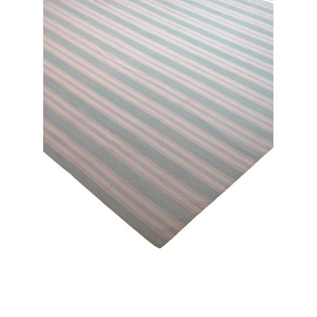 This vintage 6x9 Dhurrie flat weave is an exciting new entry in Rug & Kilim’s esteemed collection. Handwoven in wool, it...