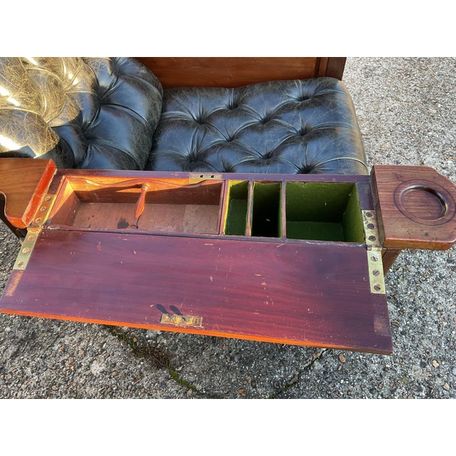 The armchair is in good used condition. Stable and sound in construction, with signs of age and use. General wear...