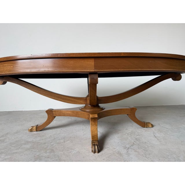 1960s 1960s Hollywood Regency Neoclassical Style Mahogany Oval Coffee Table With Brass Claw Feet For Sale - Image 5 of 12