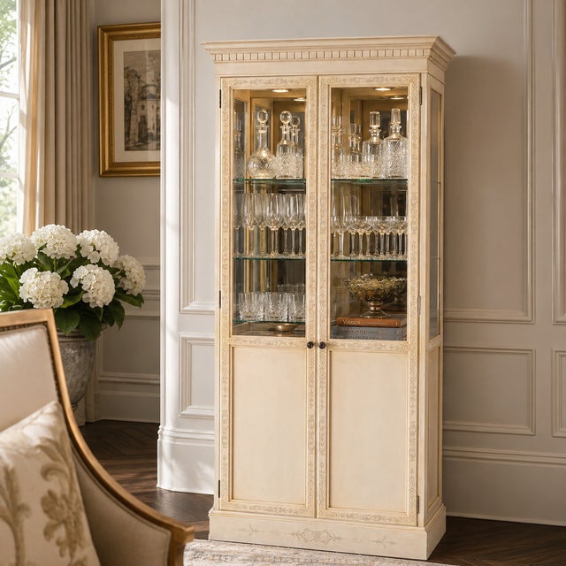 Elegant and refined, this John Widdicomb display cabinet embodies classic neoclassical design with a soft, decorative...
