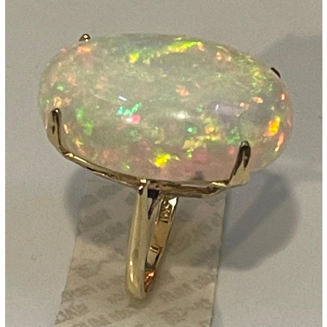 2010s 14 Carat Oval Shape Ethiopian Opal Cocktail Ring 14 Karat Yellow Gold For Sale - Image 5 of 18