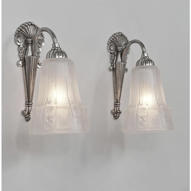 A.Richard & Muller frères A stunning pair of 1925-1930 French art deco wall lights in nickel on cast solid brass or bronze...