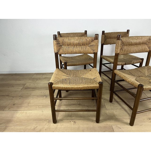 Set consisting of 4 wooden chairs with rope seats, model LS4/B designed by Tito Agnoli, Italian-made in the 1960s. The...