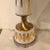 Chic and swanky slim mid century hand painted.glazed ceramic lamps with elongated gold diamond/argyle detail and outfitted...