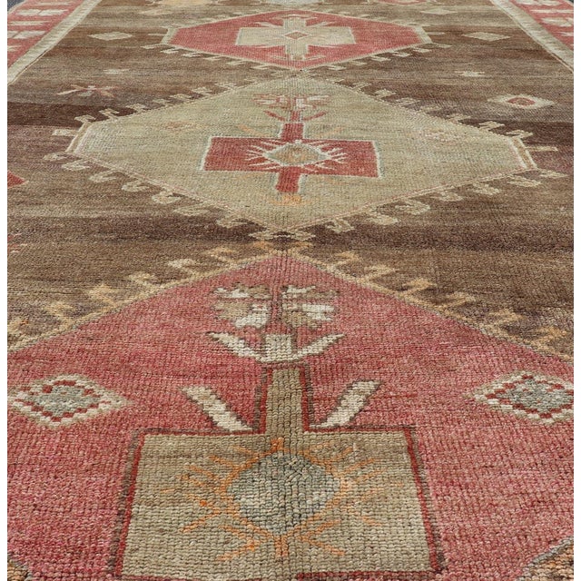Tribal Vintage Turkish Kars Tribal Rug in Earthy Tones With Reds For Sale - Image 3 of 11