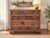 A distinctive vintage four-drawer chest by Flint & Horner Co. of New York, thoughtfully refinished with an artistic silk-...