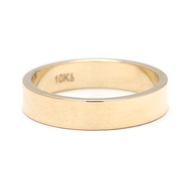 Ring Size 6 Rise Off Of Finger: 1.4 mm Width: 4 mm Weight: 2.1 dwts. / 3.2 grams Stamps: "10k" flat band SKU: R4033 A...