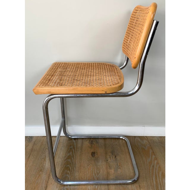 Marcel Breuer Cesca Cantilever Chair featuring a tubular chrome-plated steel frame and natural woven cane inserts. Unmarked