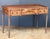 An exquisite Scottish writing table or console desk of mahogany from the Regency period, featuring a beautifully moulded...