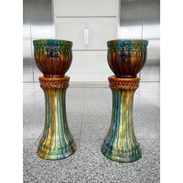 Handcrafted in Spain, these vintage planters consist of two pots and two column bases, in the signature rich polychrome of...