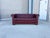 This classic Chesterfield sofa is upholstered in deep red leather with rich, subtle tones and a beautifully aged vintage...