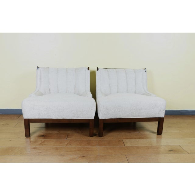 Great pair of Hollywood Regency Club Chairs. From the 1960s. Both has been reupholstered and refinished. In good...