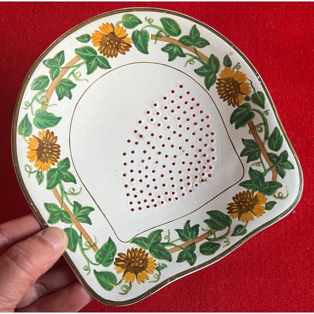 Antique 19th century creamware dairy skimmer or strainer for cream. Measures 7" x 6 3/4". Decorated with a flowering vine...