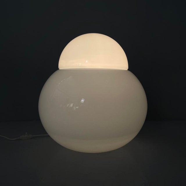 Italian modern table lamp Drama by Sergio Asti for Fontana Arte, 1970s Table lamp model Daruma with a round base. The...