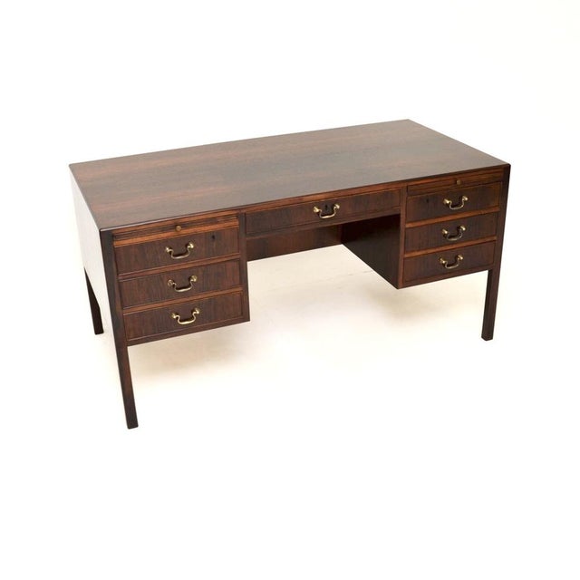 A stylish and extremely well made Danish vintage desk by O. Bank Larsen Mobelfabrik. It was made in Denmark, it dates from...