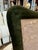 Elegant picture frame upholstered in rich forest-green velvet, featuring a softly curved, asymmetrical silhouette with...