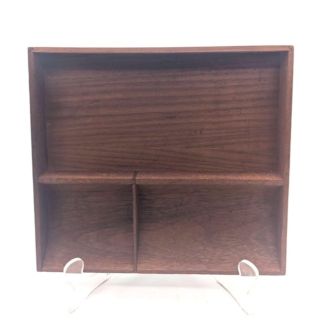Offered is a partitioned Teak wood vide poche caddy tray made in Denmark in the 1960s. It can be used on a dresser (for a...