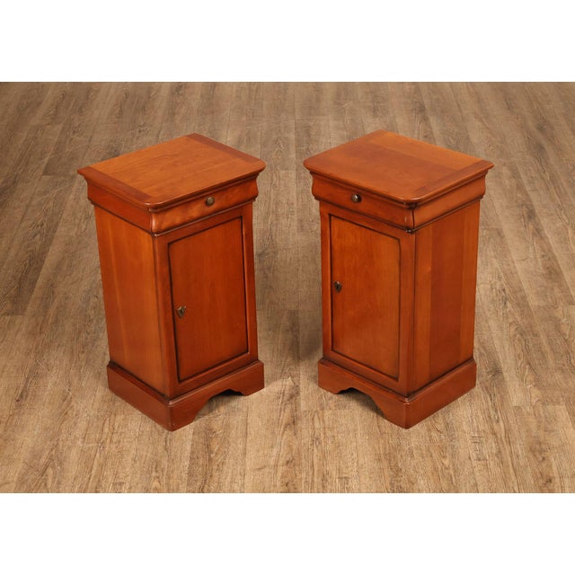 High Quality French Made Pair Of Cherry Nightstands Executed In The Louis Philippe Style. These Nightstands Feature...