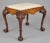 George I style walnut stool, the rectangular top with a slip-in seat above shaped burr walnut frieze, raised on cabriole...
