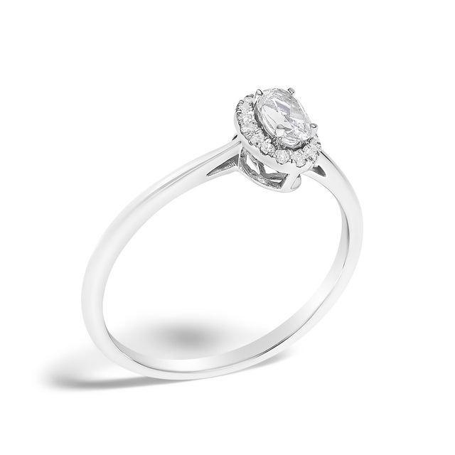 10K White Gold 5X3MM Oval White Topaz and Diamond Accent Halo Ring (I-J Color, I1-I2 Clarity) - Ring Size 6.5 For Sale - Image 4 of 7