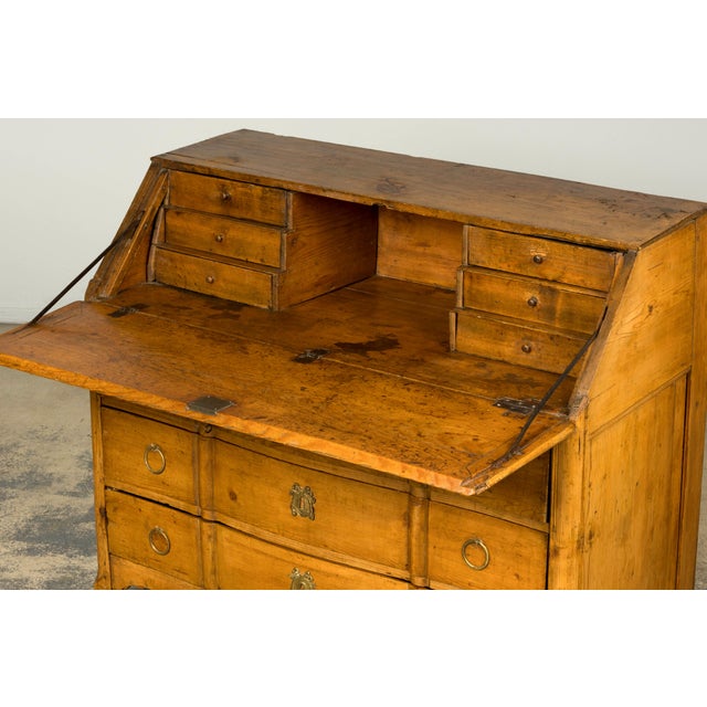An early 19th century French Provincial pine secretary, sourced in Provence, France. Constructed in solid pine and...
