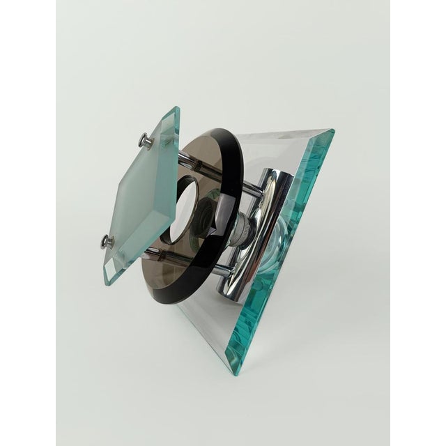 A pair of 2 twins vintage wall lights, assuredly made in italy, as you can see from the beautiful thick colored and...