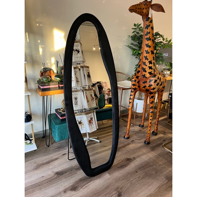 Transform any room with this stunning designer-inspired irregular mirror. Featuring a unique organic shape and premium HD...