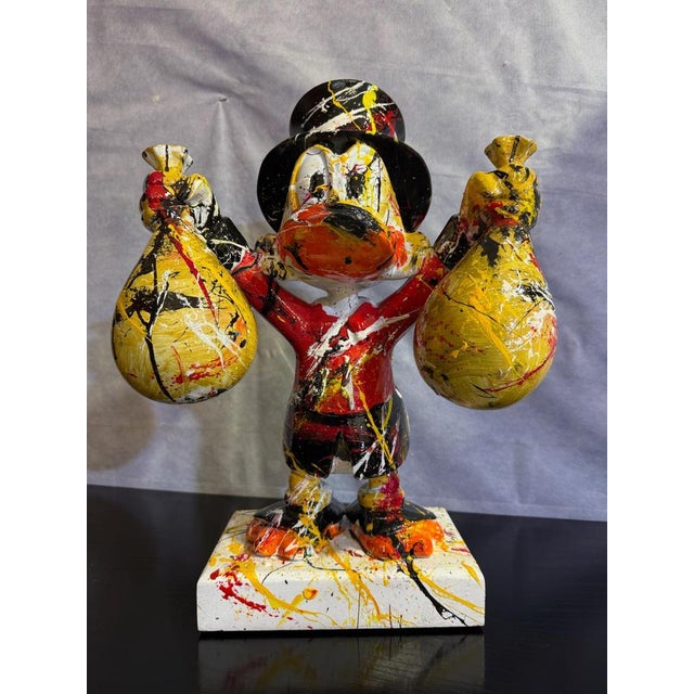 A contemporary resin sculpture by Italian artist Silvio Formichetti. The work depicts an iconic pop-style character...