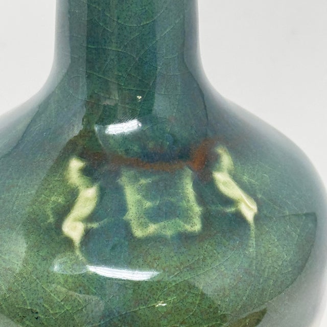 Vintage French ceramic bottle originally made for Gaston de Lagrange cognac, finished in a beautifully mottled green glaze...